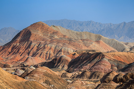 中国亚山地公园的彩虹山脉天空岩石首脑旅行远足地貌丹霞砂岩悬崖条纹图片