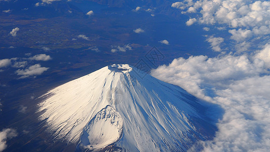 藤山山和白雪的顶角世界公吨蓝色鸽子顶峰火山飞机风景眼睛天空图片