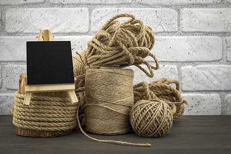 用绳子和石板 混合的麻蛋球包装绳索亚麻纤维圆圈材料细绳绞线装潢棉布图片