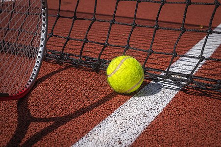 网的阴影和围绕网球的吵闹声游戏网球场娱乐乐趣白色服务竞赛活动闲暇行动图片