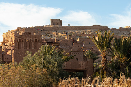 摩洛哥 古老的堡垒 Unesco遗产遗址权力全景角斗士日落大篷车旅行木头游客遗产商队图片