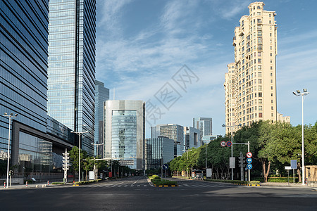 城市中心景观 现代商业背景建筑阳光金属大街天空财产沥青反射玻璃地面背景图片