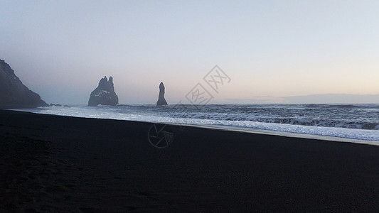 冬季风景 海洋海滩和冰原的黑火山沙悬崖风暴编队支撑旅游海岸线假期海浪日落海景图片