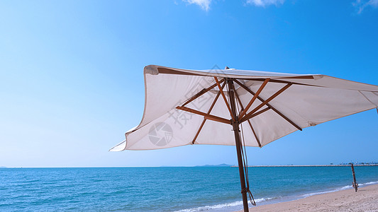 白布彩色纹理海滩伞风景白色旅行木头耀斑场景土地地平线织物阳伞图片