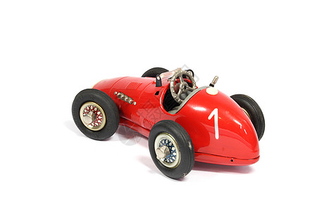 红色跑车白色背景的老旧古典玩具铁赛车速度红色公式车轮乐趣驾驶运输汽车发动机收藏品背景