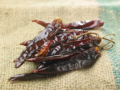 干辣辣椒红色套袋调味品棕色香料蔬菜食物草本植物美食烹饪背景图片