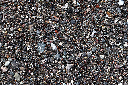 详细近视碎石和石块的碎石地灰色材料岩石石头棕色白色鹅卵石海滩种子食物图片
