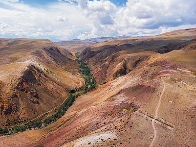 与火星表面相仿的黄色红山 纹状黄雀形空中拍摄侵蚀荒野地质学地形地球旅行全景天线科学风景图片