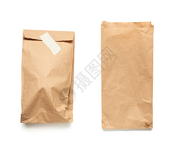 白色背景上隔绝的棕色克拉夫纸袋食物店铺零售环境包装牛皮纸商品生态午餐市场图片