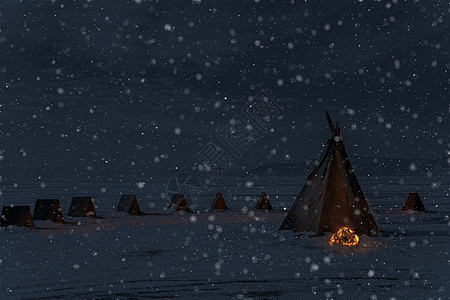 冬季降雪和露营帐篷 有营火 夜光照片图片