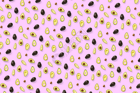 牛油果 背景由粉红色背景上孤立的鳄梨片制成 平铺新鲜成熟的鳄梨和鳄梨片海报饮食情调食物异国种子打印蔬菜营养水果图片