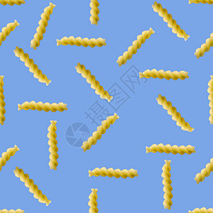 Fusilli 意面随机平板放在没有阴影的蓝色背景上 可以用作原面食背景 海报 横幅而不是图案食物白色美食大利面生意黄色营养烹饪图片