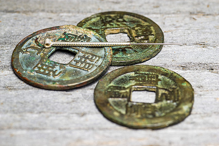 中国硬币上的针刺针世界文化金属医疗卫生古董工具保健工作室遗产图片