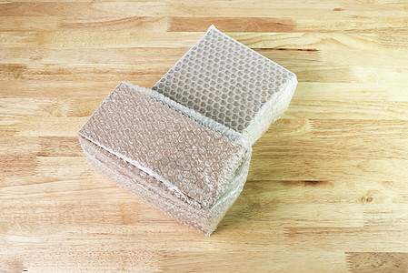 保护产品c 用泡沫包装覆盖盒子的泡泡布软垫服务缓冲材料白色安全商品解决方案塑料压力图片