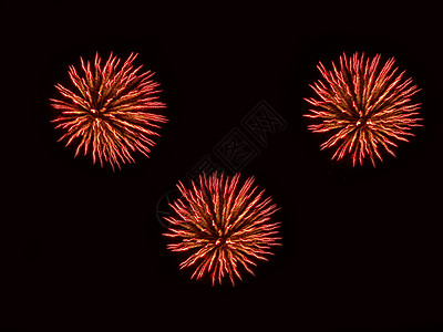 夜空中多彩的烟花烧伤火箭红色天空奇观耀斑庆典黑色黄色黑暗图片