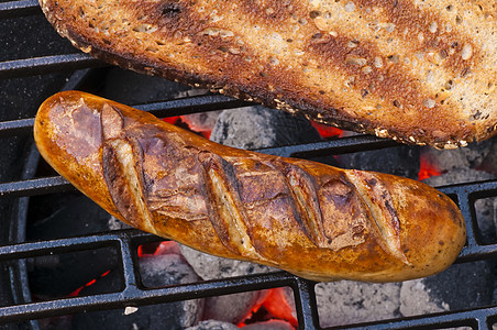 烤烤肉烤香肠网格黑色棕色木炭熟食面包煤炭食物图片