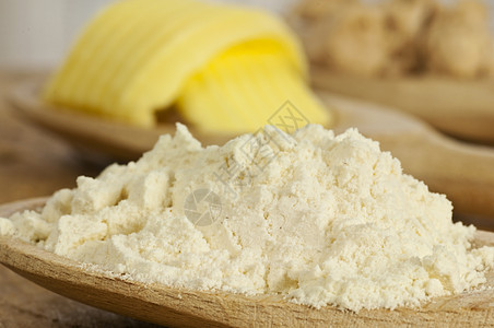 烤饭 奶油勺子食物小麦面粉用具木板木头白色黄油谷物图片