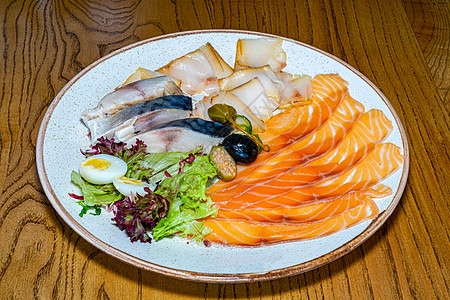 美味的海鱼零食沙拉鱼片盐渍鲱鱼午餐熟食盘子餐厅营养海鲜图片