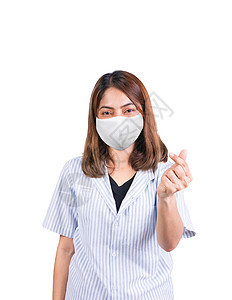 妇女显示迷你心脏标志和戴布面罩安全展示手势女性拇指面具诊所感染预防织物疾病图片