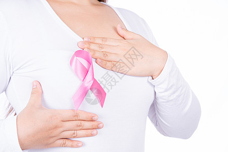 女性胸部上的乳腺癌意识丝带和在白色背景下隔离的自我检查 广告概念的医疗 保健组织丝绸生活疾病手术外科检查化疗癌症药品背景
