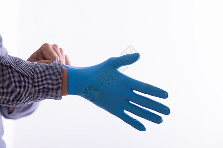 男子佩戴手套 保护免受病毒感染疾病安全感染预防背景图片