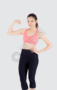 美丽的肖像 年轻的亚洲女性 穿着运动服装的冒充胸罩女孩二头肌女士活力手臂衣服健身房肌肉图片