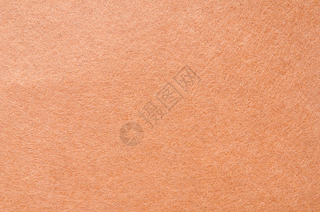深棕色或橙色天鹅绒或浮板花壁的纹理背景背景图片