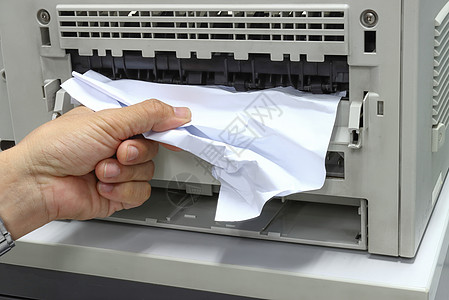 办公室打印机中拆纸厂 纸张加联器技术员除纸斯塔克倾倒服务电气替代品电脑打印技术维修复印机男人图片