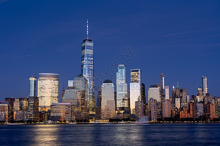 美国纽约市下曼哈顿晚夜天际线城市时段吸引力天空景观商业球衣摩天大楼建筑日落图片
