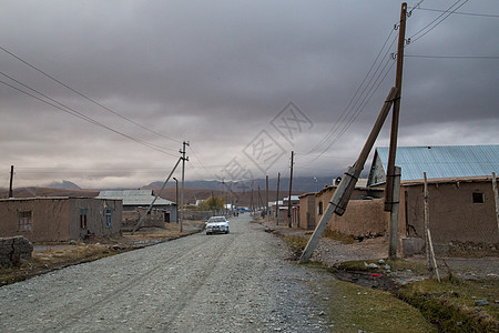 南吉尔吉斯斯坦的SaryMogul农村大亨旅游游客街道山脉边界碎石建筑学顶峰图片
