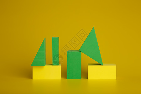 黄色背景上带有绿色和黄色几何图形的抽象双色调背景图片