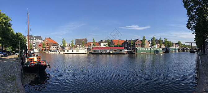 利尤沃登周围运河的全景救生艇房子建筑学城市图片