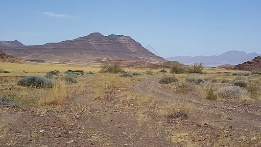 达马拉兰阿巴瓦布河床的泥土路岩石泥路石头花河风景天空图片