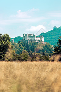 堡 奥地利美丽的中世纪城堡 旅游景点场地牧歌城市蓝天建筑学建筑全景据点太阳山脉图片