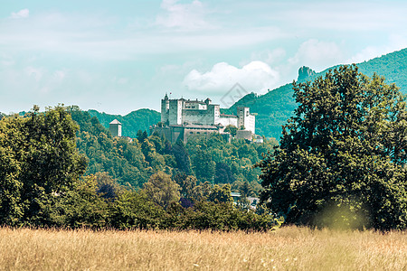 堡 奥地利美丽的中世纪城堡 旅游景点太阳城市阳光蓝天建造建筑全景堡垒牧歌秀场图片