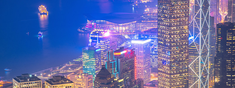 香港市中心著名的香港天际线城市景观在黄昏时分从香港维多利亚峰看场景日落首都旅行顶峰摩天大楼市中心港口商业电影图片