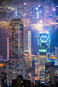 香港市中心著名的香港天际线城市景观在黄昏时分从香港维多利亚峰看首都港口吸引力建筑地标灯光建筑学日落码头商业图片