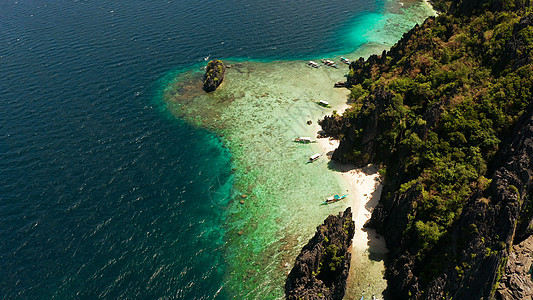 热带海水环礁湖和海滩 菲律宾 埃尔尼多岩石海景游客海洋蓝色支撑天线沙滩海岸假期图片