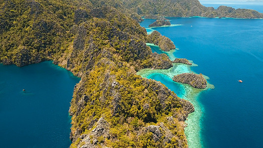 位于菲律宾热带岛屿的Barracuda山湖 科隆 帕拉万海景蓝色旅行情调鸟瞰图风景悬崖航空天堂冠冕图片