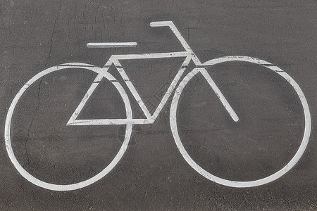 自行车在路上的标志 道路标记 自行车道指示运动轮子信号警告小路安全路线适应症运输地面背景图片