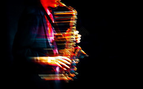 萨克斯声播放器在舞台上表演运动萨克斯管辉光乐器线条喇叭射线独奏者音乐会艺术家图片