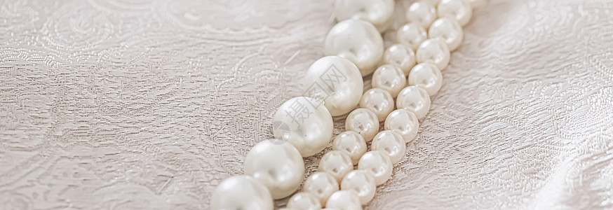 gif动图珍珠首饰作为奢侈品 gif织物奢华项链白色新娘礼物丝绸婚礼材料宝石背景