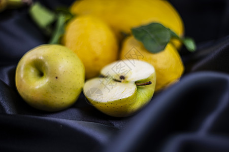 黑色背景的黄黄色水果团体果汁饮食情调蔬菜热带李子收藏西瓜食物图片