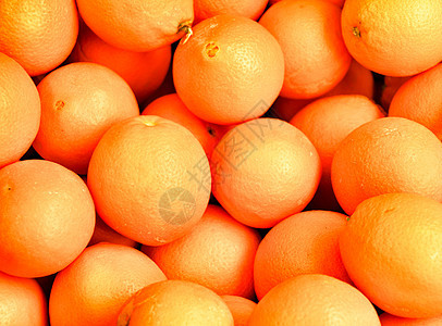 在市场摊位出售的橙子异国果汁早餐甜点保健产品水果饮食卫生橘味图片