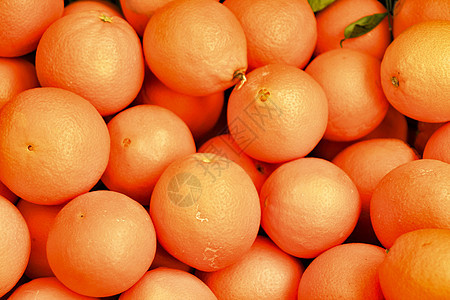 在市场摊位出售的橙子营养情调橙汁果汁早餐橘味产品卫生饮食甜点图片