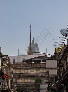 曼谷市视线与现代高楼建筑和泰国寺庙完全并存的泰神旅行地标首都房子天空旅游市中心街道教堂社区图片