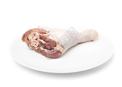 白板上的一只RAW火鸡腿白色动物火鸡烹饪饮食大腿检查皮肤鸡腿盘子图片