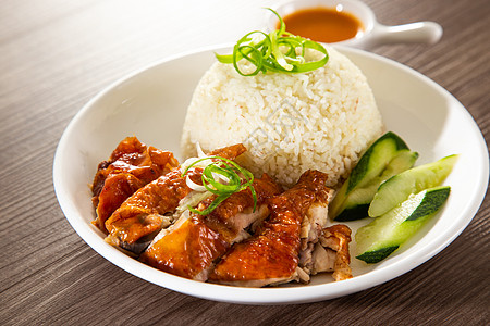 卖鸡的摊位上烤鸡饭鸡饭中心美食小贩食品家禽午餐盘子鸡腿食物图片