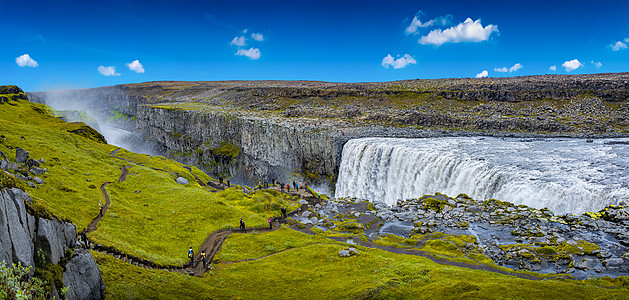 欧洲最大和最强大的瀑布的全景 称为冰岛的 Dettifoss 靠近 Myvatn 湖 在蓝天 夏天通量观光旅行者游客环境岩石溪流图片
