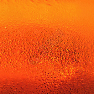 啤酒 啤酒杯的美丽细节与泡沫 抽象彩色背景酿造酒吧饮料口渴气泡金子啤酒厂酒精玻璃宏观图片